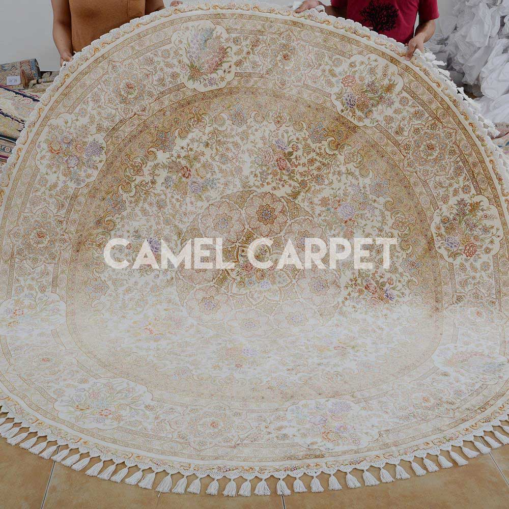 Floral Hand Knotted Silk 7 ft round rug.jpg